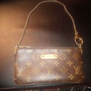 Authentic Louis Vuitton clutch with original chain
